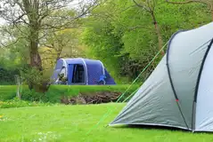 Large tents on a non electric grass pitch (8m x 9m)