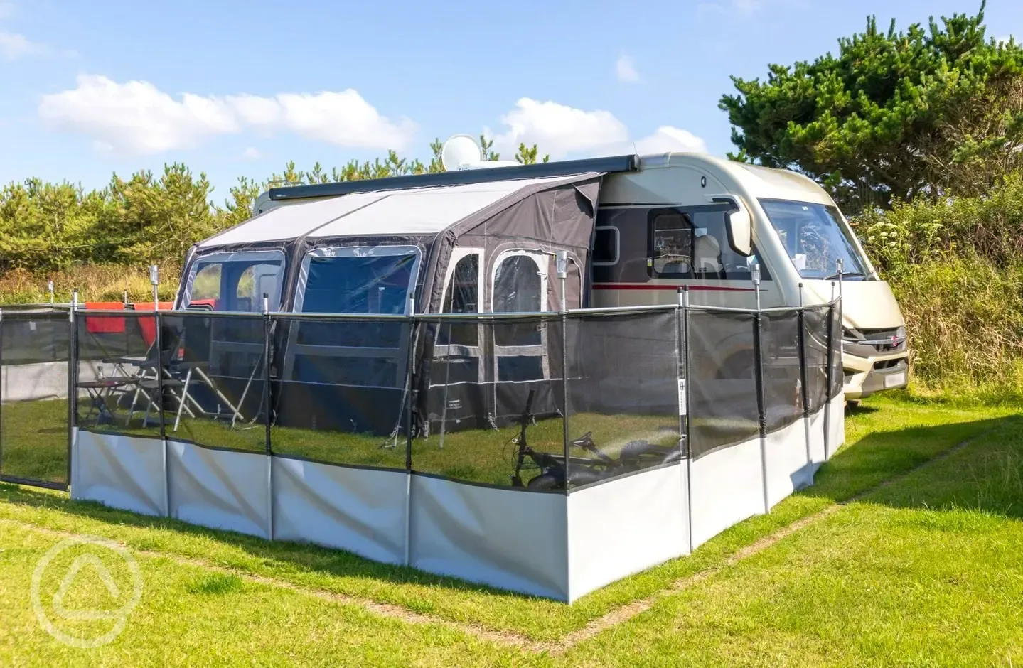 Super grass pitches with electric, grey waste, a water point and TV connection