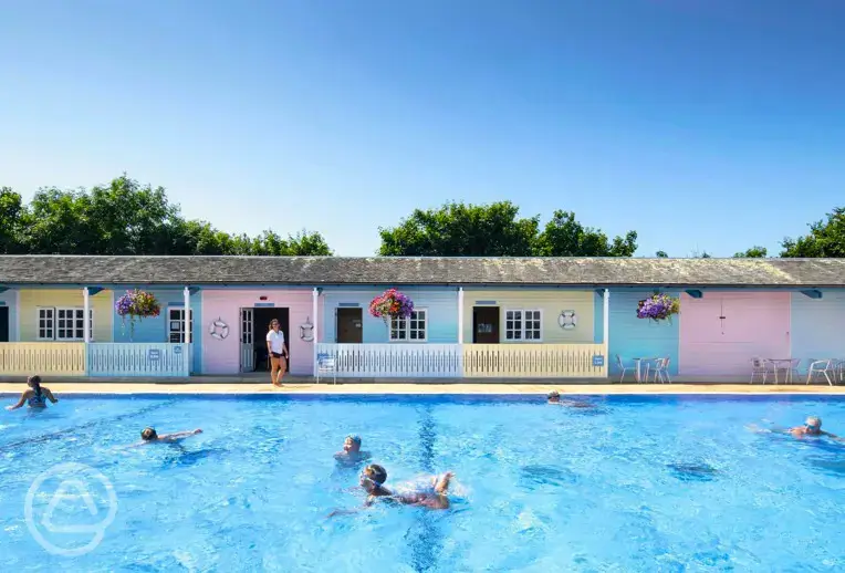 Outdoor heated swimming pool, shallow toddler pool and jacuzzi for adults