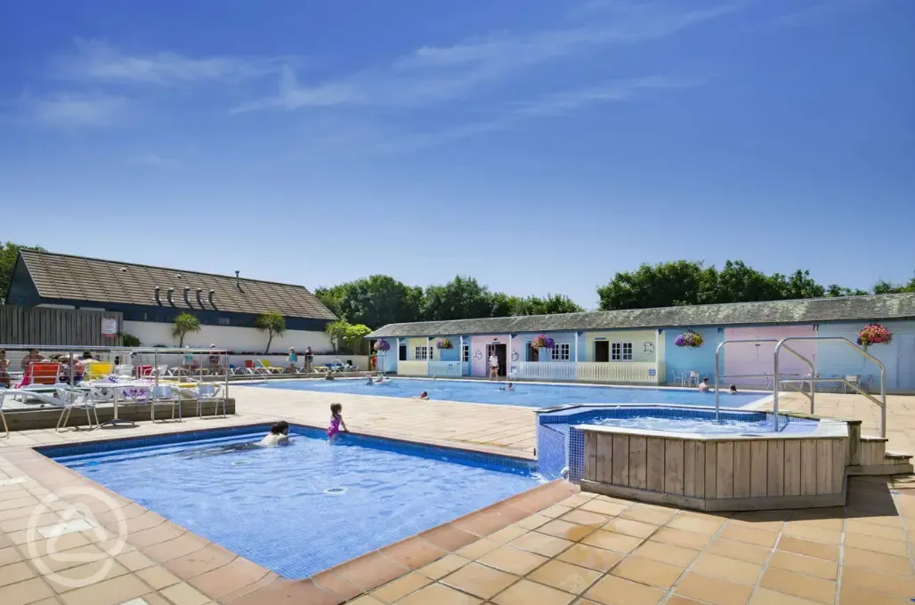 Outdoor heated swimming pool, shallow toddler pool and jacuzzi for adults