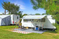 Grass pitches with space for an awning