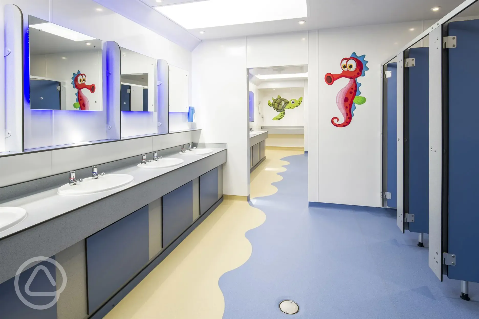 Toilet block with baby changing units