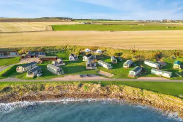 Aerial of the glamping units at Sauchope Links Park on the Fife Coast