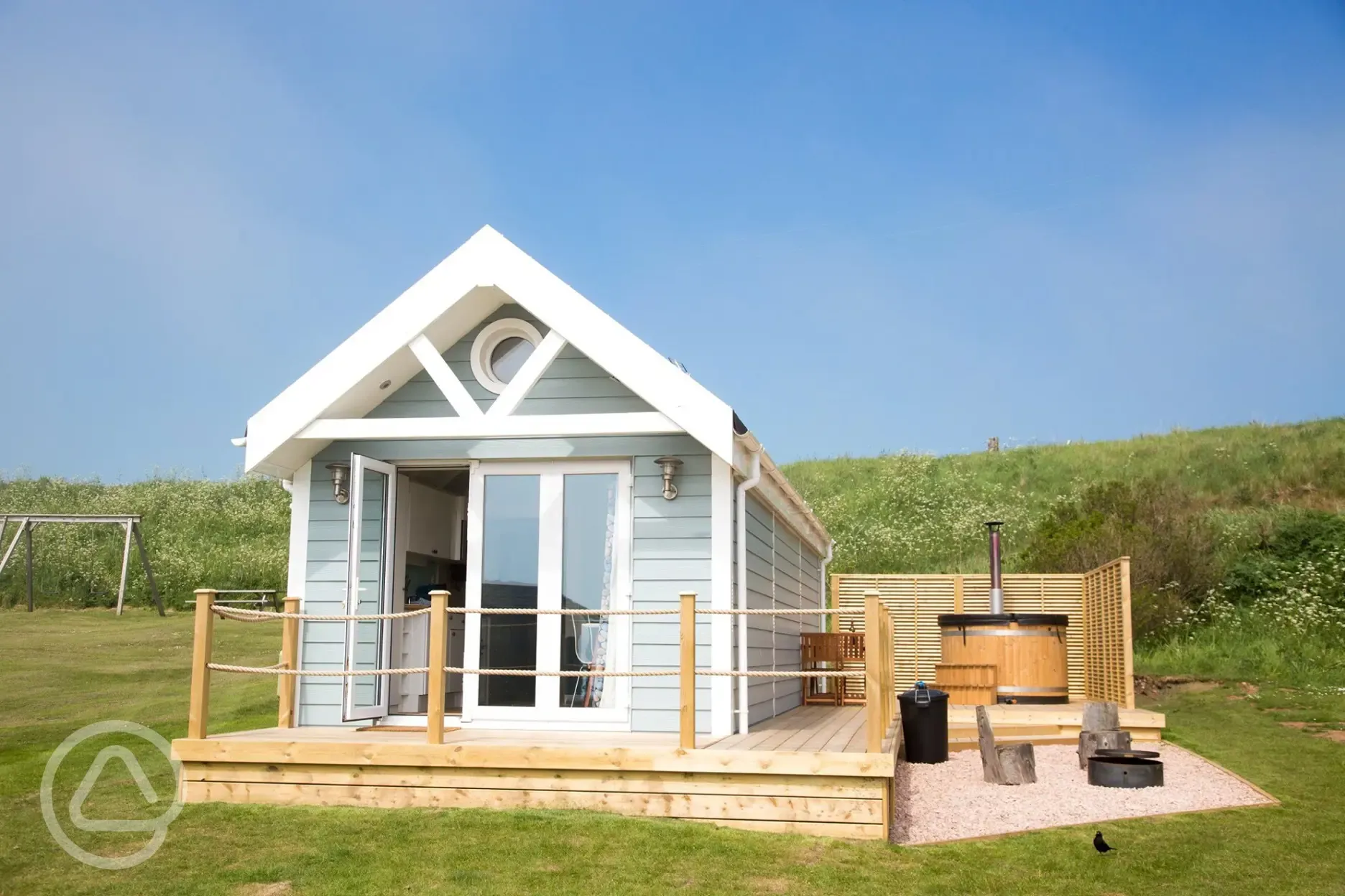 Deluxe beach hut with hot tub