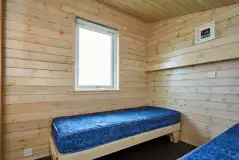 Standard beach hut twin beds (bring own bedding and towels) Standard beach hut twin beds (bring own bedding and towels)