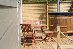 Deluxe beach hut outdoor seating and wood-fired hot tub Deluxe beach hut outdoor seating and wood-fired hot tub