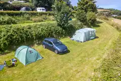 Non electric grass pitches with hedges between levels