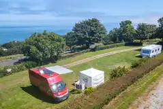 Electric hardstanding and grass pitches