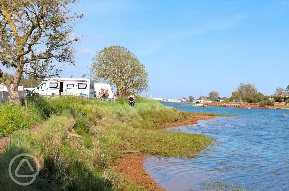 Grass pitches by the water