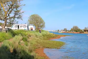 Grass pitches by the water