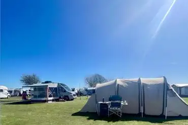 Electric grass pitches with a 10 amp hook up for tents and touring units