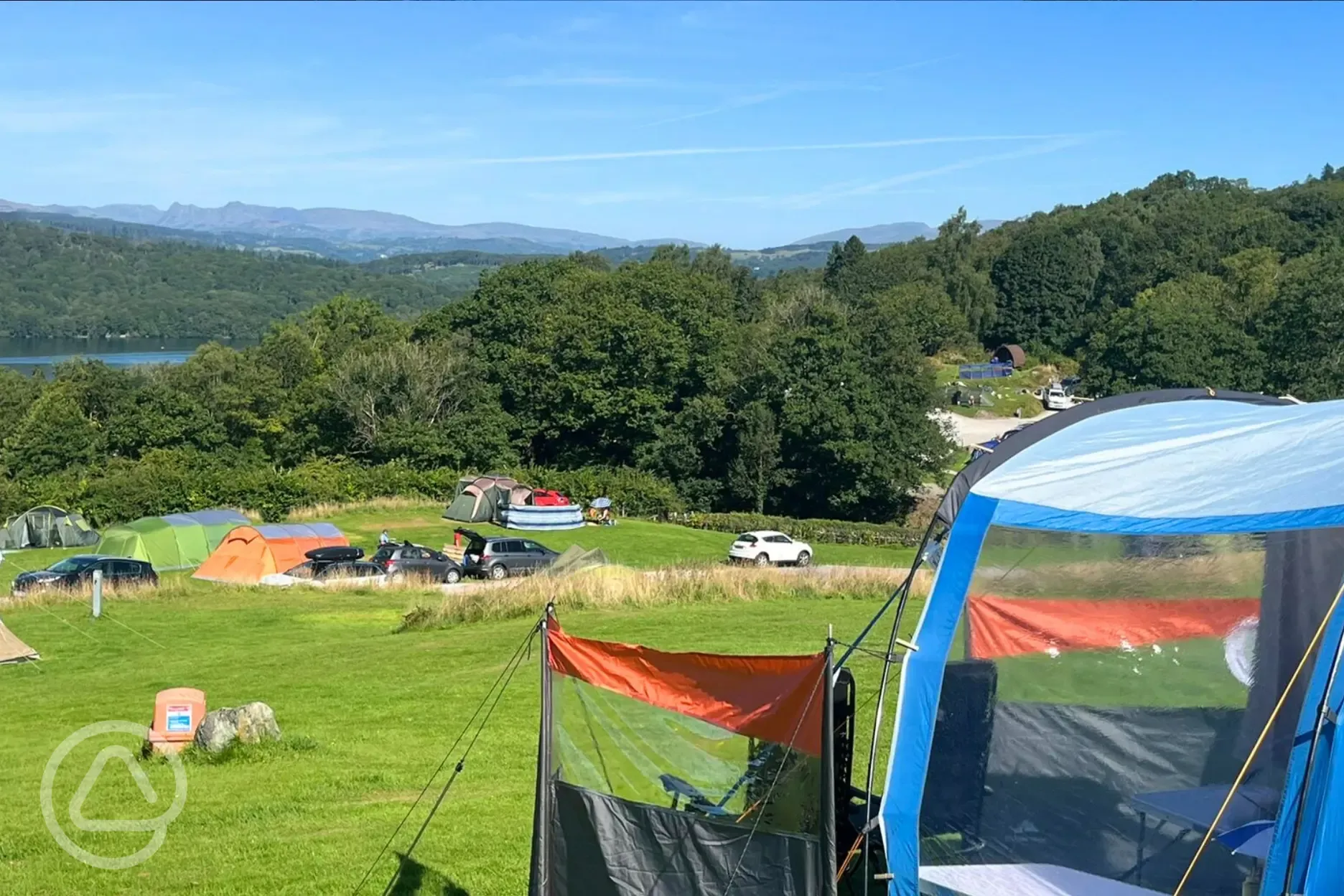 Non electric fellside grass pitches with views to Windermere