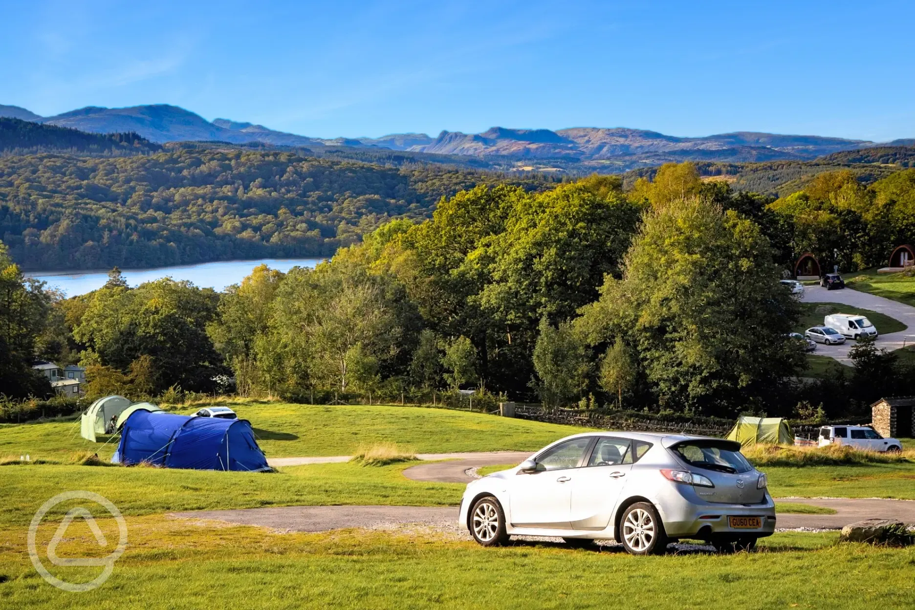 Non electric fellside grass pitches with views to Windermere