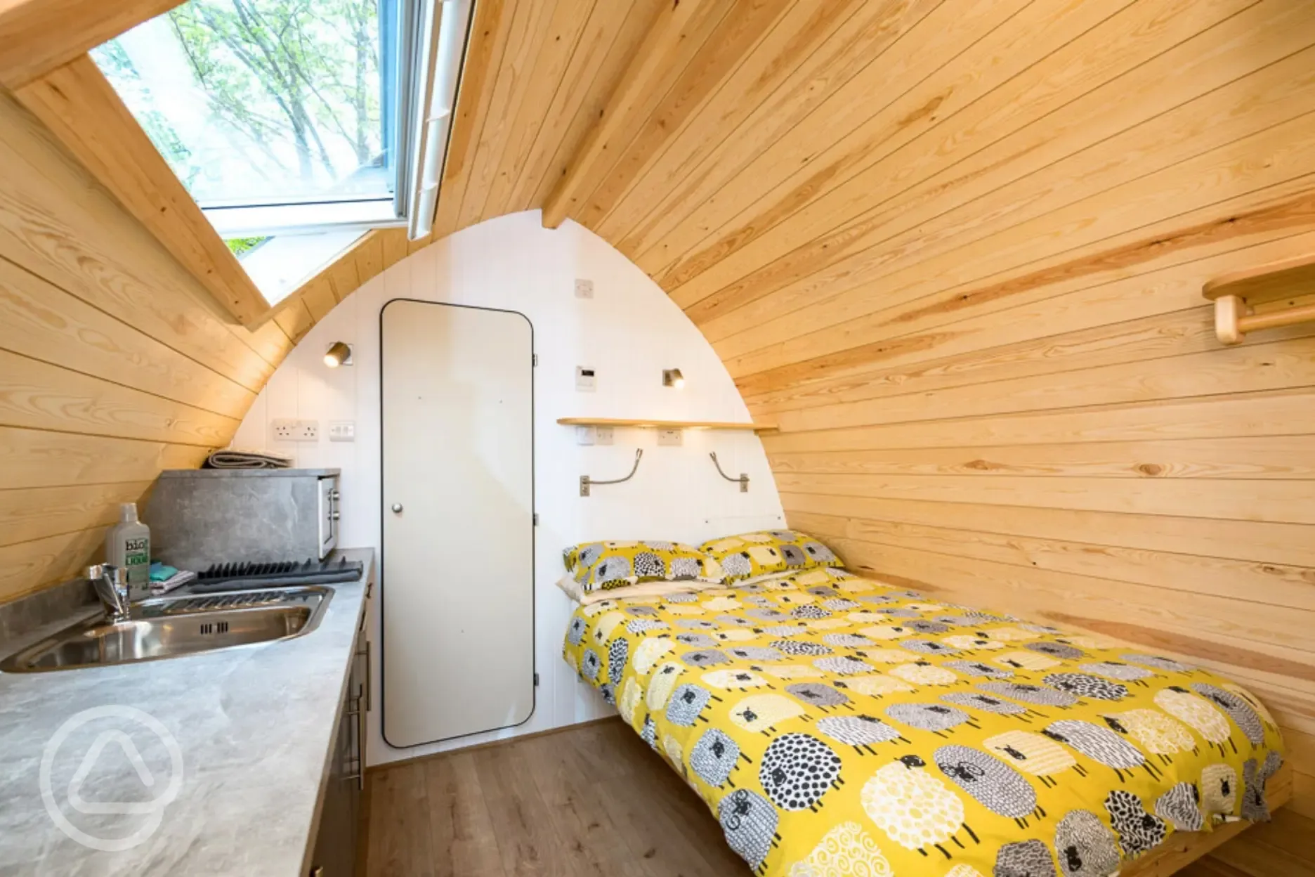Deluxe glamping pod with a double bed (with bedding) and kitchen