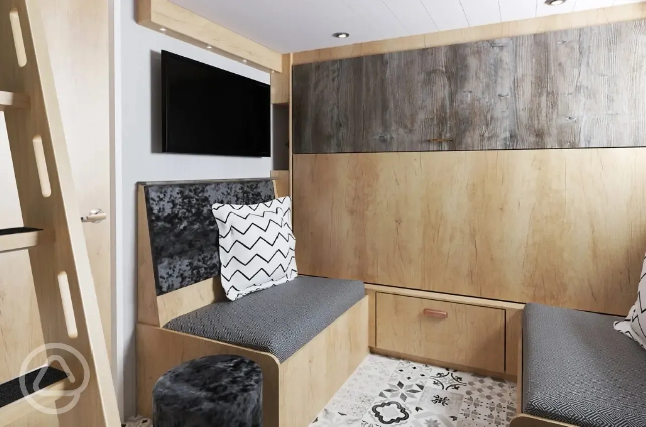 Ensuite glamping S-Pod - dining area that converts to a double bed