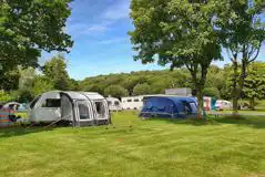 Electric grass pitches at Little Winnick Touring Park