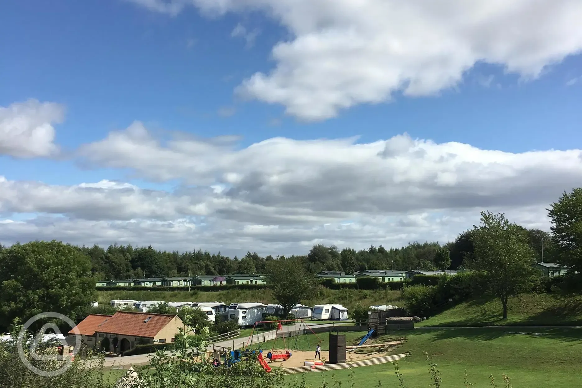 View over bottom toilet and shower block