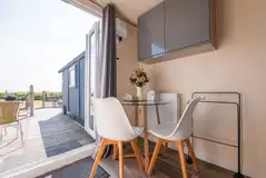 Estuary view shepherd's hut seating area and views