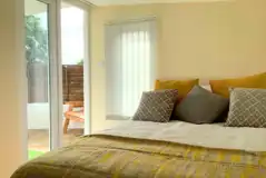 Garden View ensuite glamping cabin bedroom