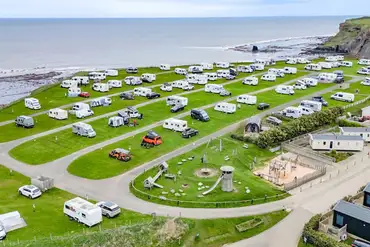 Aerial of the grass and hardstanding pitches at Whitby Holiday Park 