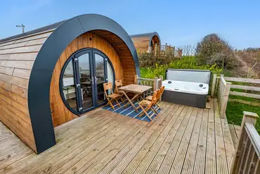 Ensuite glamping pods with decking and hot tubs