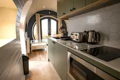 Abbey View Hideaway glamping pod equipped kitchenette and dining area Abbey View Hideaway glamping pod equipped kitchenette and dining area