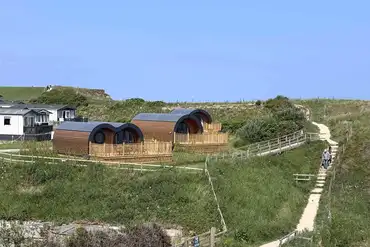 Two and four person glamping pods with hot tubs