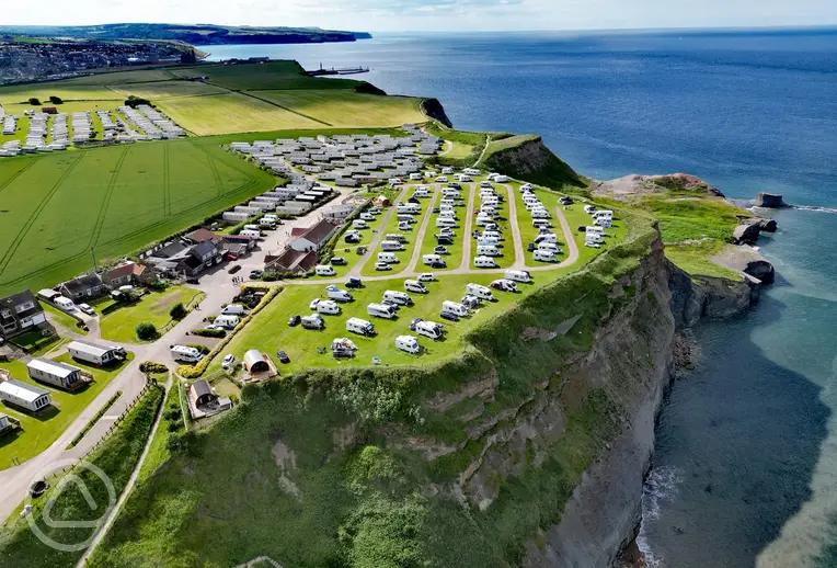 Aerial of Whitby Holiday Park overlooking Saltwick Bay