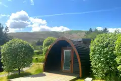 Camping pods with a small deck area overlooking Cumbrian fells Camping pods with a small deck area overlooking Cumbrian fells