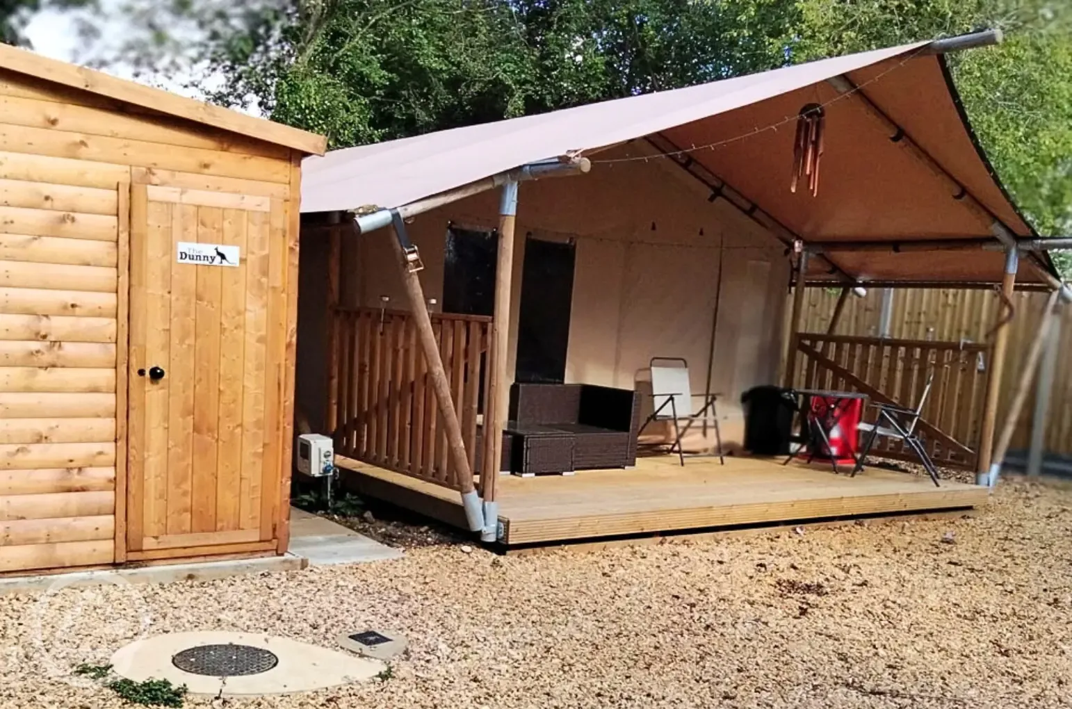 Outback safari tent and facilities, including a shower and toilet Outback safari tent and facilities, including a shower and toilet