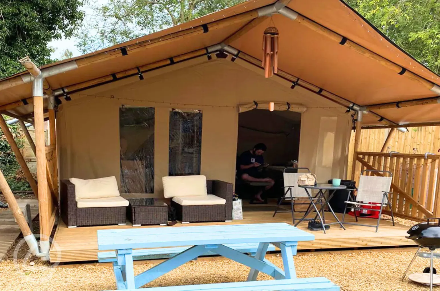 Outback safari tent decking and seating area with BBQ Outback safari tent decking and seating area with BBQ