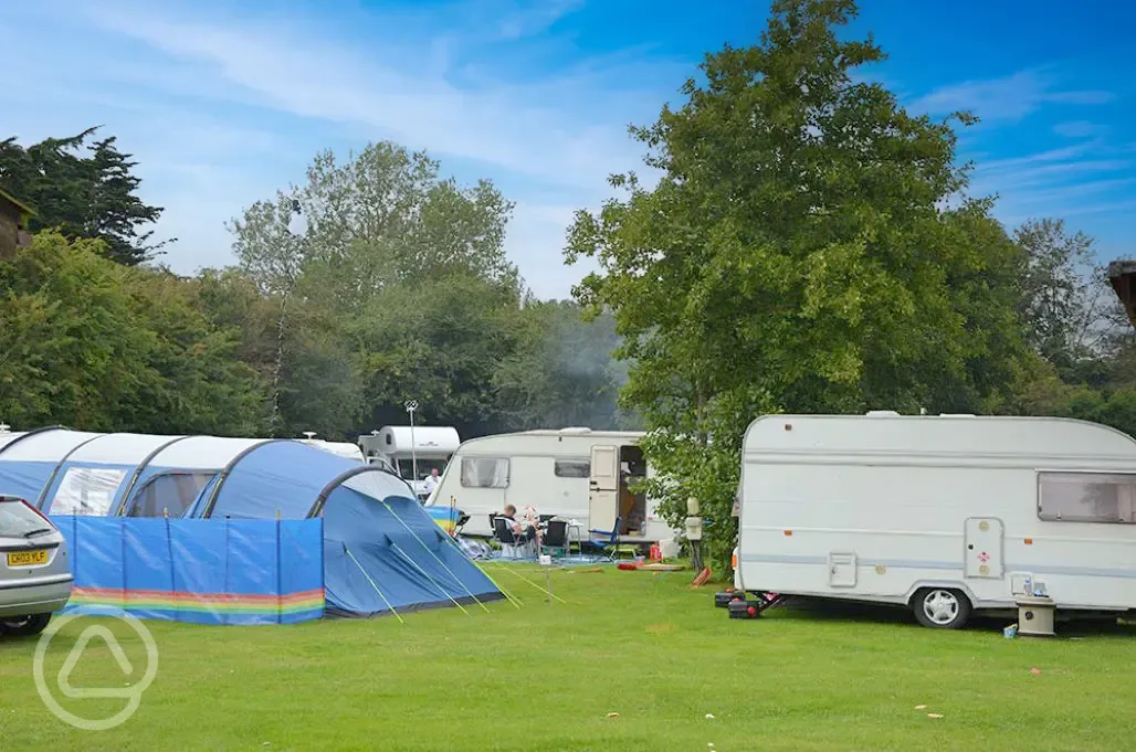Tents and caravans on grass pitches