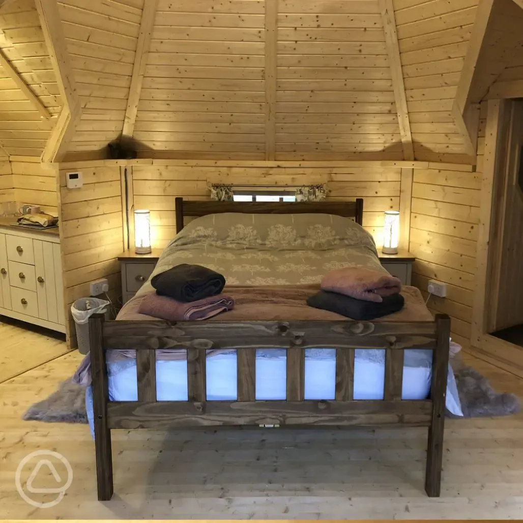 Enchanted cottage bedroom with a king size bed