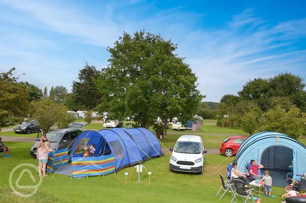 Tents on non electric grass pitches with space to park vehicles