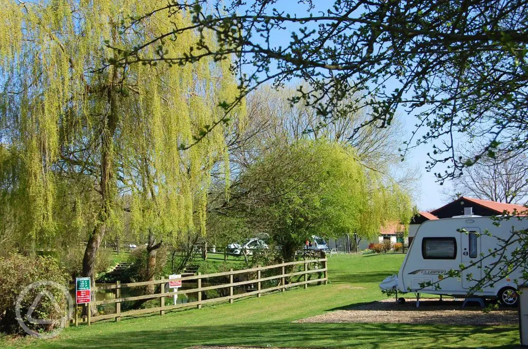 Hardstanding pitches overlooking the fishing lake