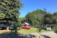 Semi hardstanding/grass motorhome pitches with 10 amp hook ups