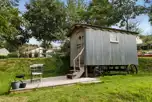 Shepherd's hut with a small outdoor deck