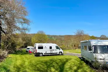 Semi hardstanding/grass motorhome pitches with 10 amp hook ups