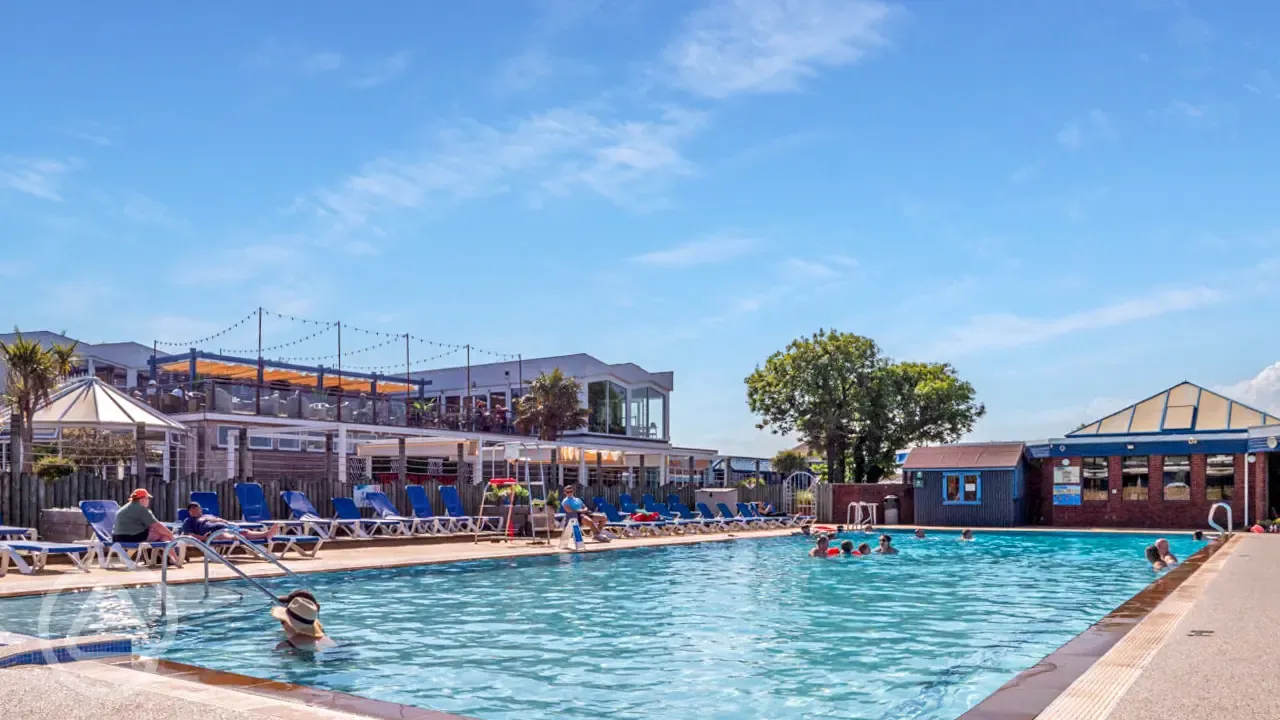 The Saltwater Pub at Beverley Park overlooking Cove outdoor swimming pool