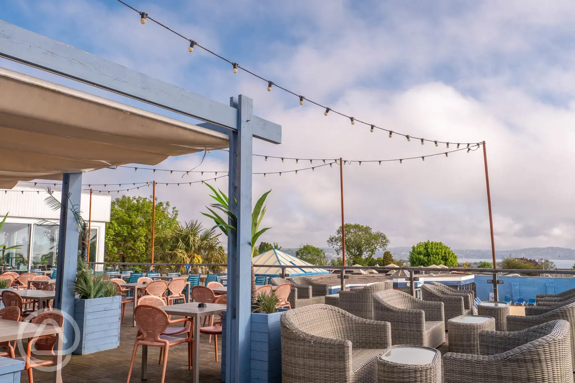 The Jetty restaurant outdoor seating with far reaching views of Devon coast