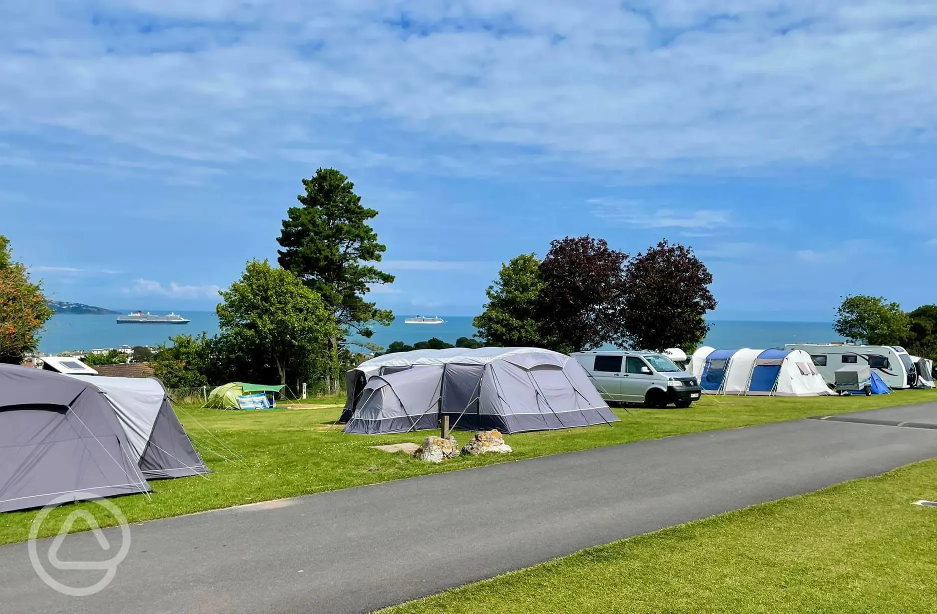 Large tents on grass pitches