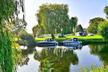 River Avon with waterside pitches and river taxis (March to October)