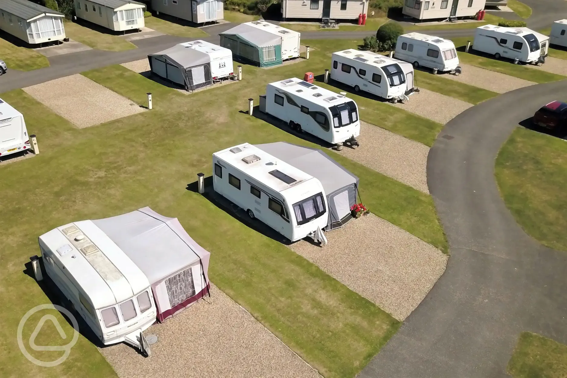 Aerial of the fully serviced all weather touring pitches