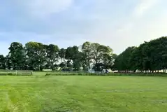 Non electric grass touring pitches with an entrance gate