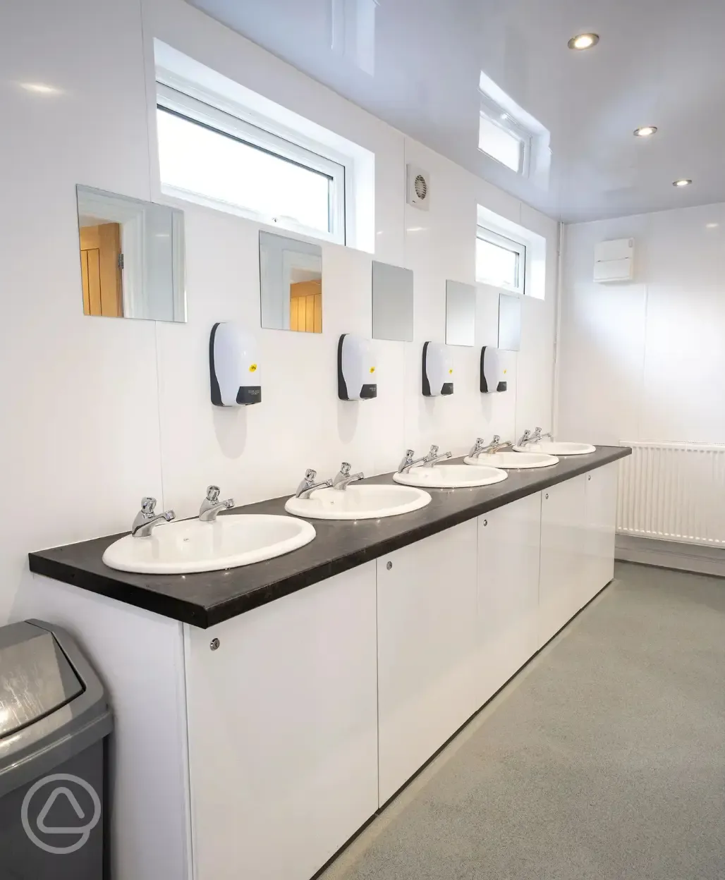 Handwashing sinks with mirrors in the facility block