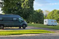 Hardstanding touring pitches with grass areas between