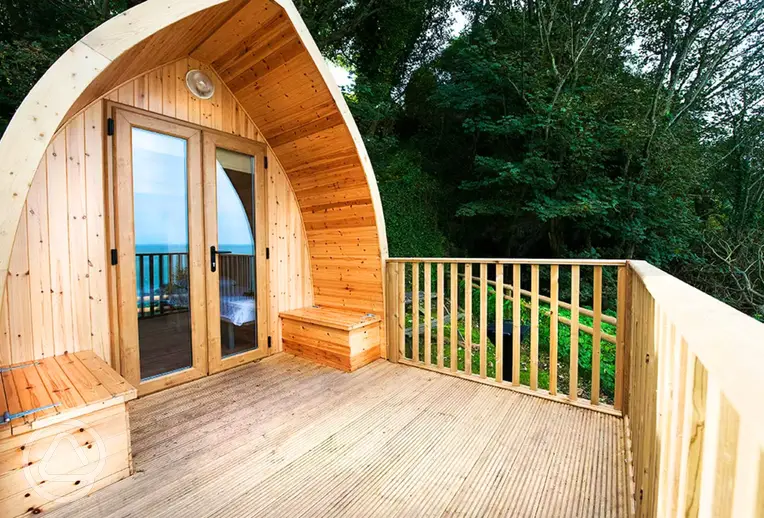 Camping pod exterior with private decking area