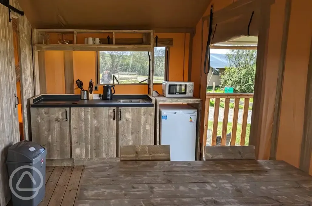 Safari tent kitchen area Safari tent kitchen area
