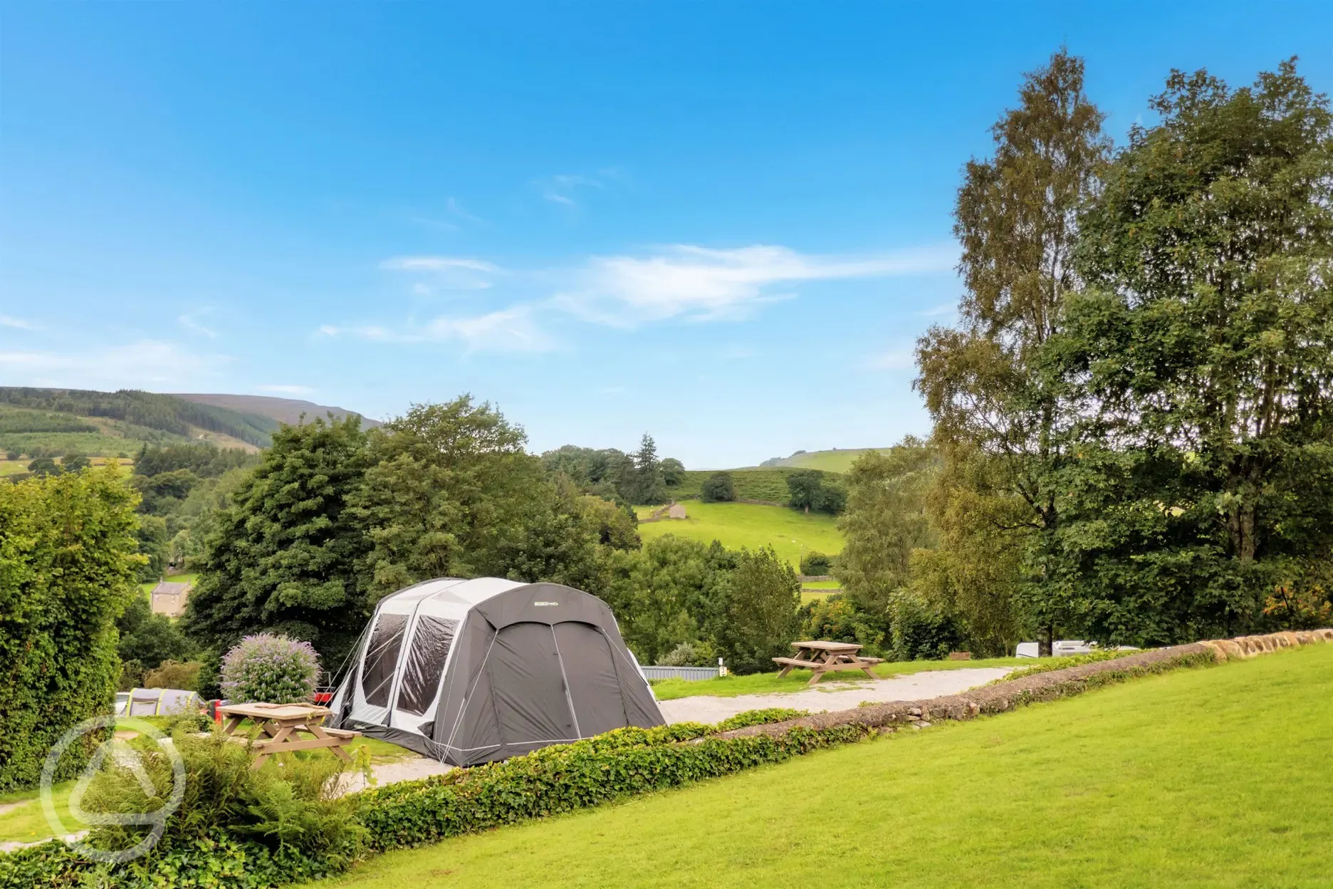 Grass pitches with private picnic bench