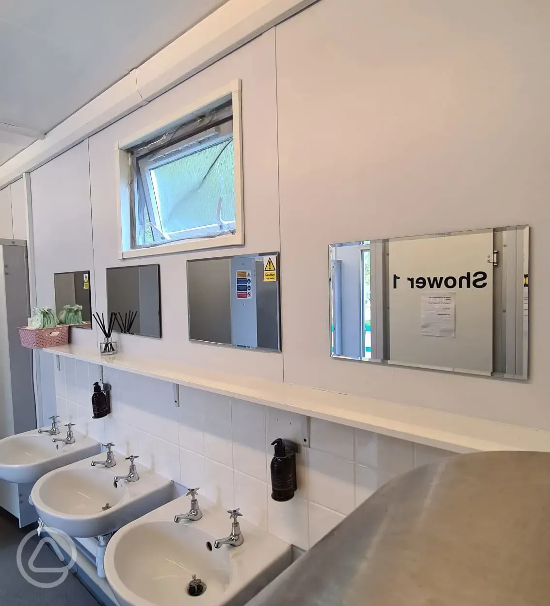 Sinks and mirrors in facility block